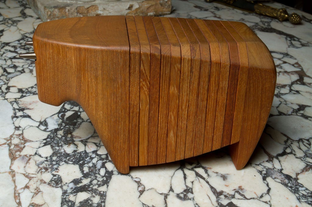 Minimalist teak sculpture of a bull, doubles as a cocktail coaster set for 12, signed: Ernst Henriksen