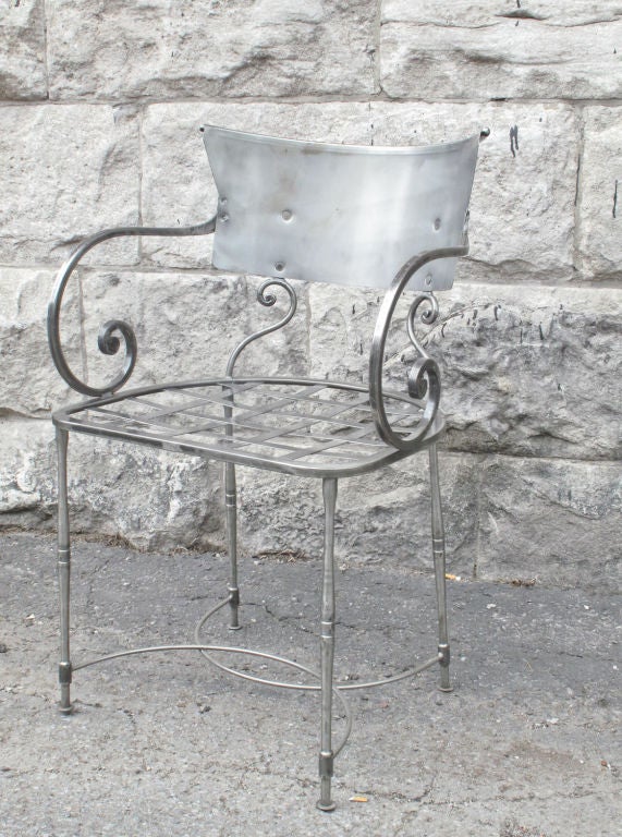 Set of Four Polished Steel Armchairs For Sale 1
