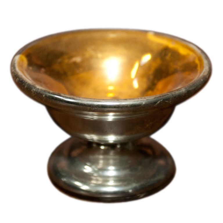 Beautiful antique mercury glass dish with gilt interior.
