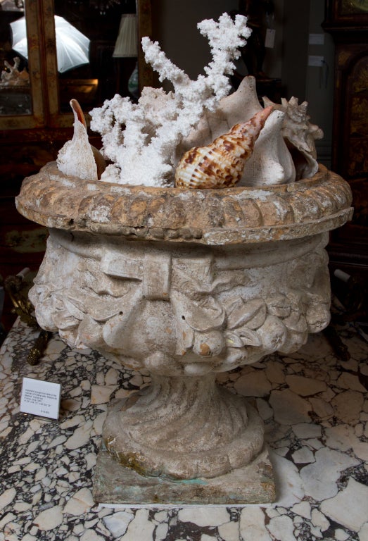 Large English terracotta urn decorated with festoons of flowers and fruits (shells not for sale).