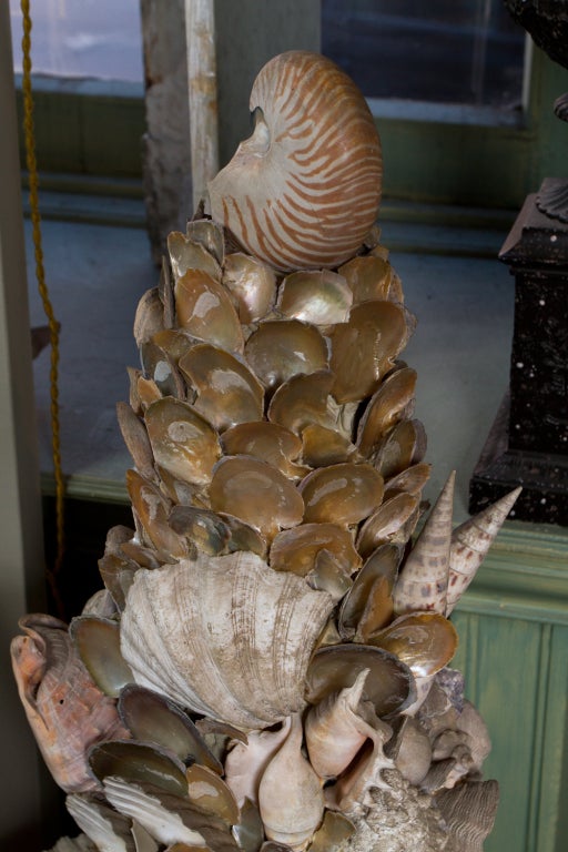 Large pair of shell mounted obelisques in the grotto style.