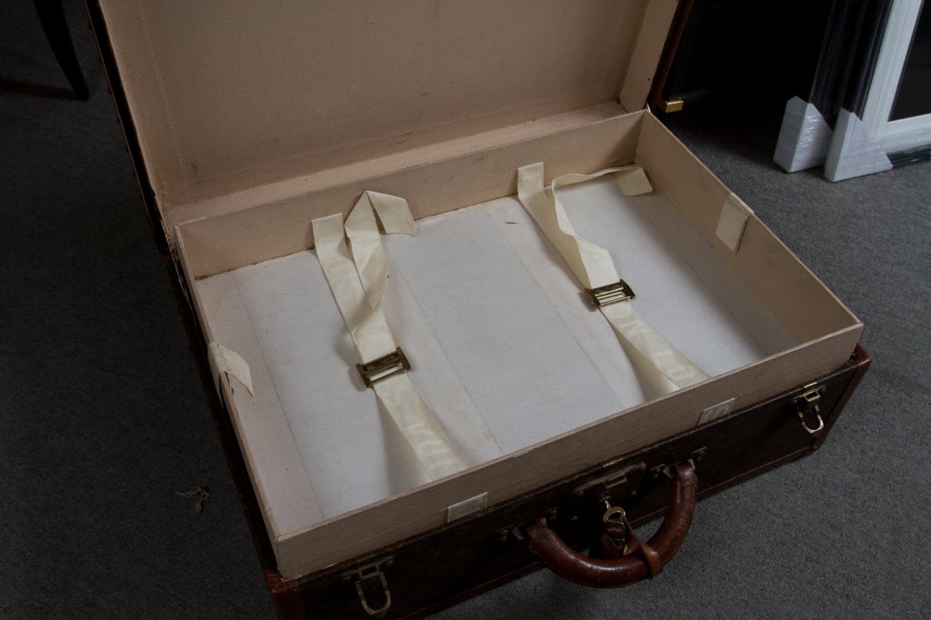 Vintage Vuitton suitcase. 4