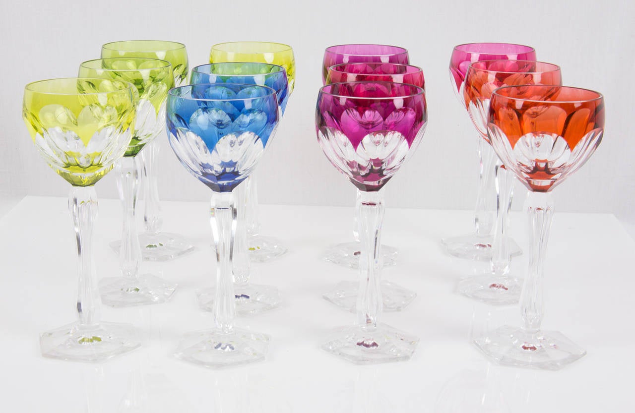 Beautiful set of 12 tall stemmed colored wine glasses by famed Belgian glass maker Val St Lambert, featuring a hand-cut-to-clear pattern called Nestor Hamlet. Each glass measures approximately 7.5