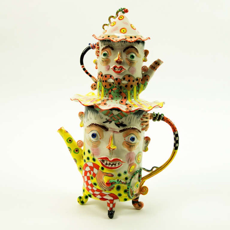 A wonderful figural face porcelain two-tier teapot and lid folk art piece, Beautifully handcrafted and painted, signed by renowned artist Irina Zaytceva. Original work of art 1999; bottom tier measures approx: 7.5