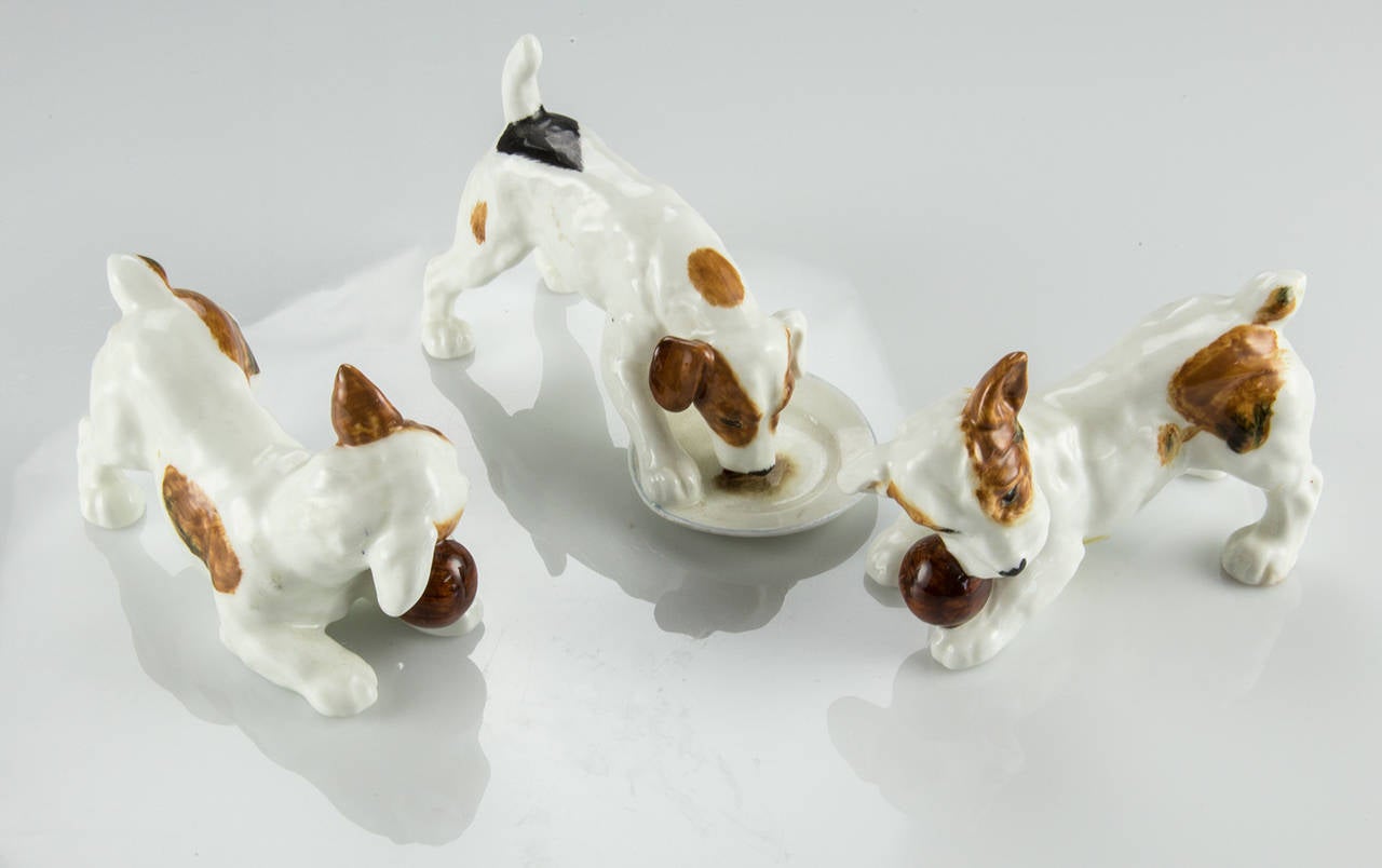 Royal Doulton bone China animal study of six dogs and four kitten cats, featuring lucky black cat, kitten on hind legs, kitten licking front paw, Yawning Beagle, Sealyham Pup with bone, Jack Russell with Ball, Jack Russell licking plate. Dimensions