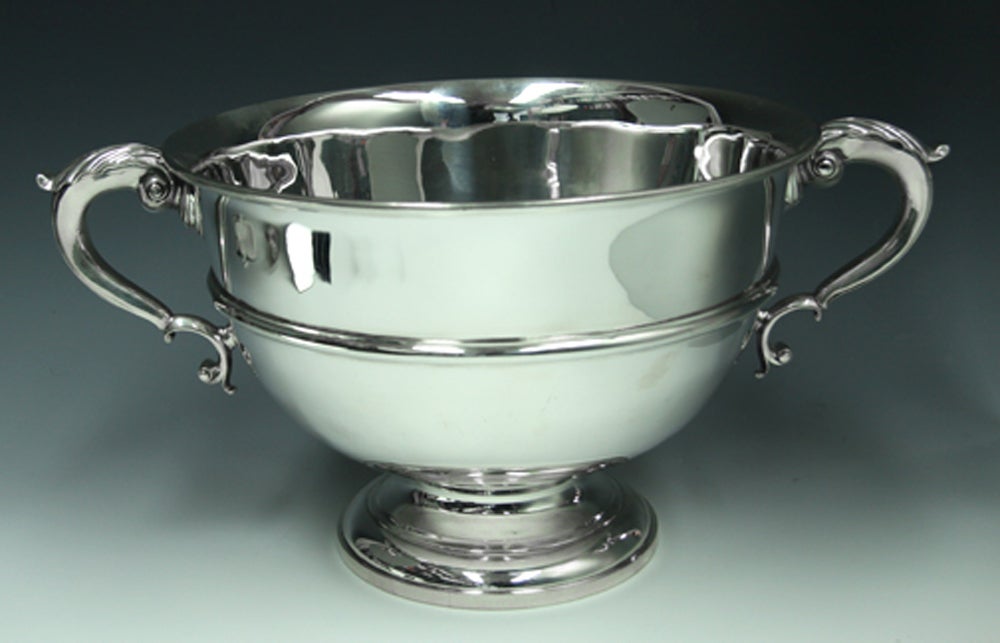 Crichton Bros London & New York Sterling Silver Punch Bowl 
Superb quality English Sterling Silver Large Bowl hallmarked London 1913 by Lionel Crichton. In the George II style with acanthus leaves design handles. Measuring an impressive 11