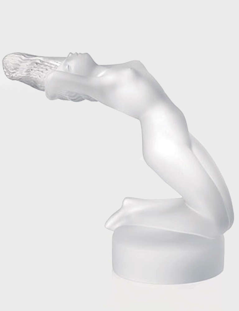 Beautiful Lalique female nude kneeling on a round base. Title: 