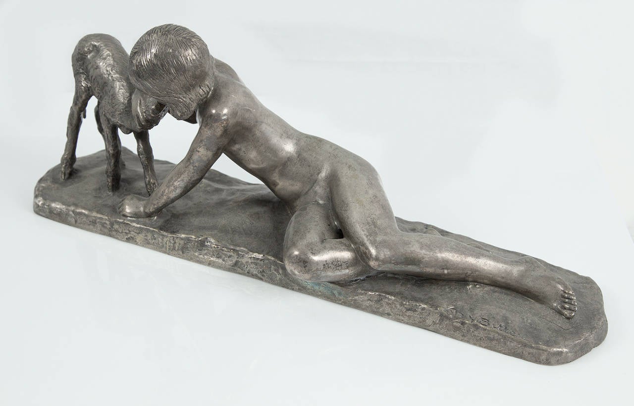 Wonderful Art Deco silvered patina bronze group depicting a nymph cuddling a fawn, signed at end of bronze base: Ary Bitter; approximate size: 20” long x 8” high x 4” wide; Ary Jean Leon Bitter (French, 1883-1973).