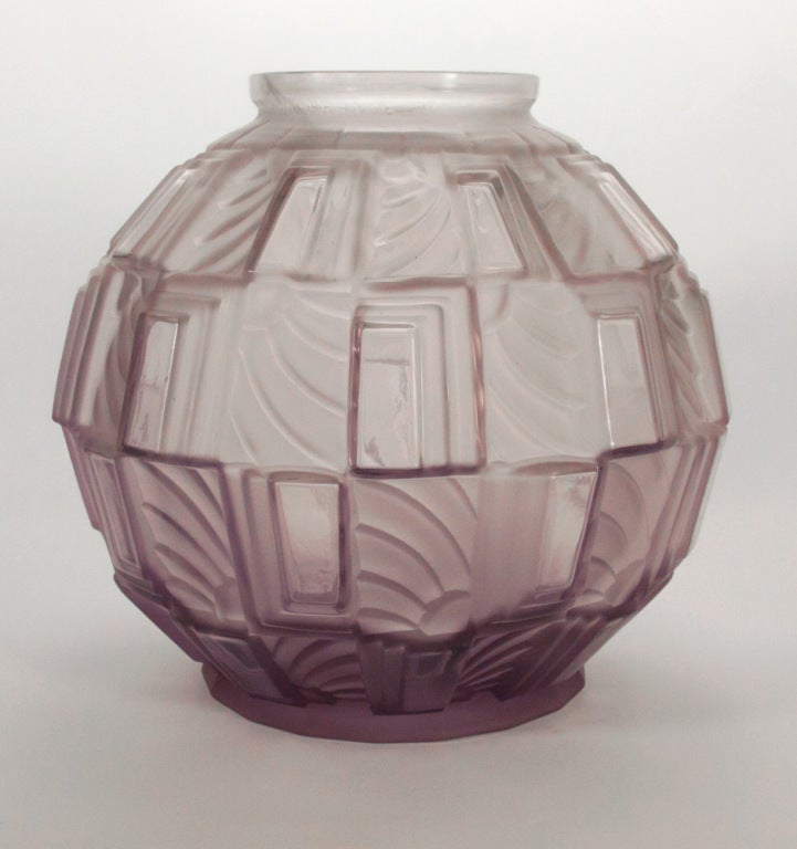 Stunning Art Deco 1920s Blown Art Glass Vase signed DANYL, depicting Sun Rays and Windows all around; Bulbous shape in light Mauve color; signed and numbered on neck: DANYL MADE IN FRANCE. A Wonderful addition to any collection! 11” high; 36”