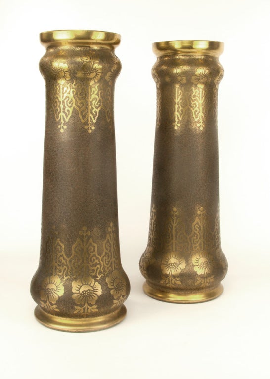 Fabulous and rare matched pair of Art Nouveau Val Saint Lambert vases, gold over handblown blue cobalt glass; finely etched with gilded bronze-patina; heavily decorated with an angular oriental influence; standouts to enhance your Living Space and