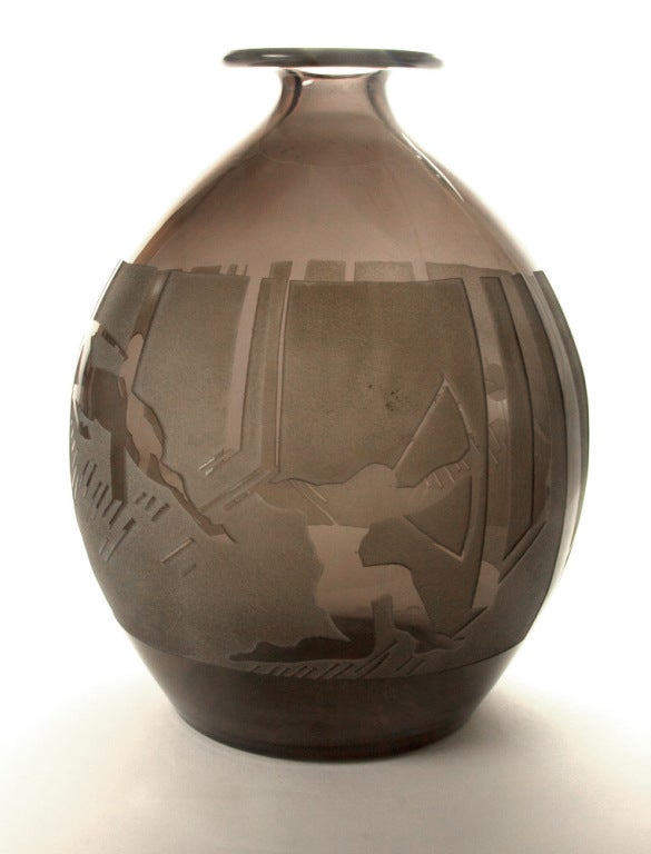 Rare and impressive Art Deco vase geometric scenes depicting an archer and antelopes; acid-etched and sandblasted smoke colored art glass; signed on base: Berlys; measuring approximate 12.5” high; a must have to add to your collection or decorate