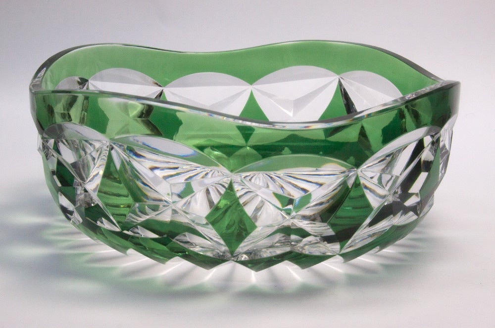 Beautiful signed Val St. Lambert circular crystal center bowl, green, hand-cut-to-clear, the glass is thick, deeply and evenly cut, without a single bobble or a glass flow inside the glass walls; signed on bottom: Val St. Lambert; circa 1950s;