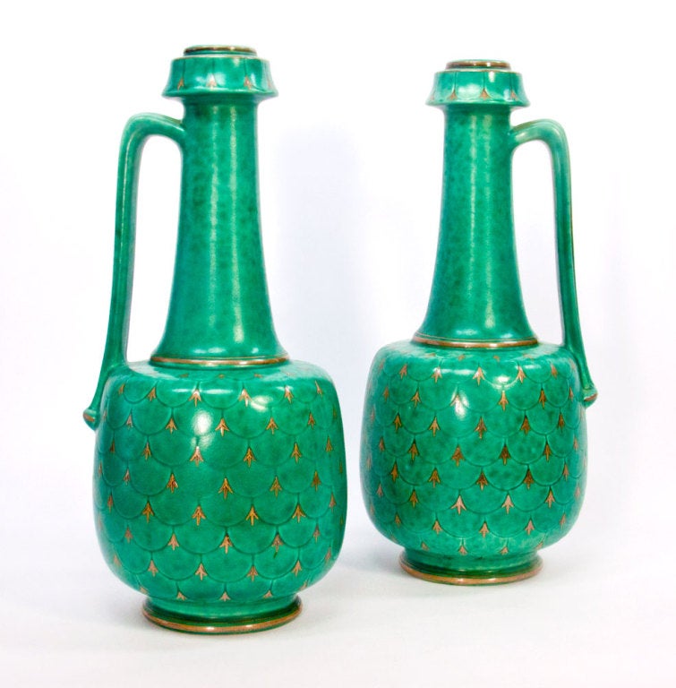 Exceptional Art Deco pair of Gustavsberg Argenta Ewers. Fine quality silver overlay decoration on mottled jade green ceramic. Larger sized items are rare and difficult to find. Signed and hallmarked on bottom bases, as shown in photos; stamped in