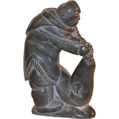 Inuit Sculpture of Hunter Catching Seal