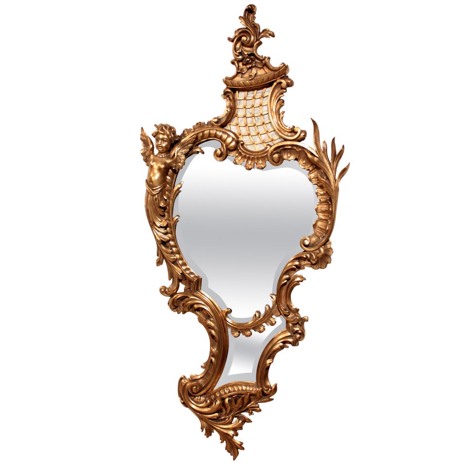 Miroir en bois doré de style Louis XV