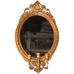 Pair of Louis XV Style Carved and Giltwood Girandole Mirrors