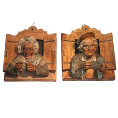 Pair of Wall Plaques Modelled as an Old Couple