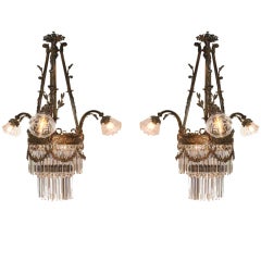 Pair of Louis XVI Style Gilt Bronze and Crystal Chandeliers