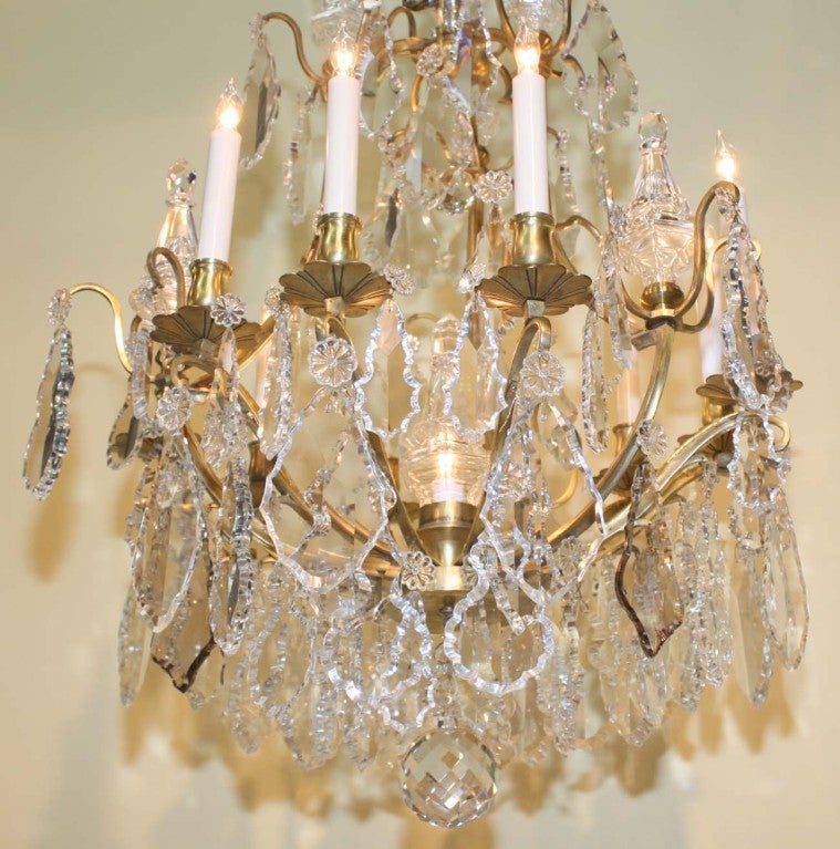 Louis XIV Style Crystal and Gilt Bronze Ten-Light Chandelier In Good Condition For Sale In Montreal, QC