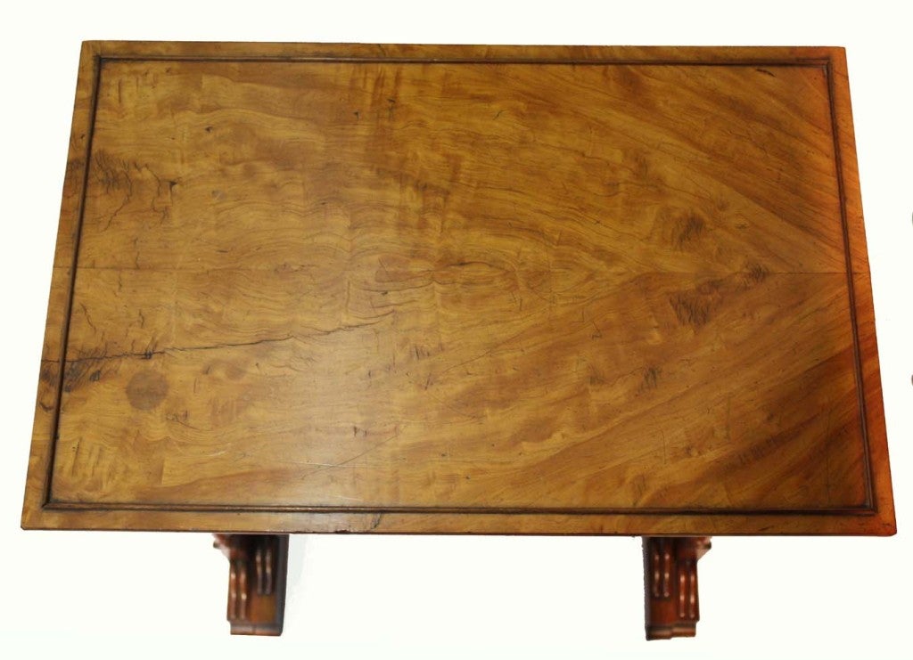 Quartetto of nesting tables, the satinwood and inlaid surfaces are raised on slender turned supports .