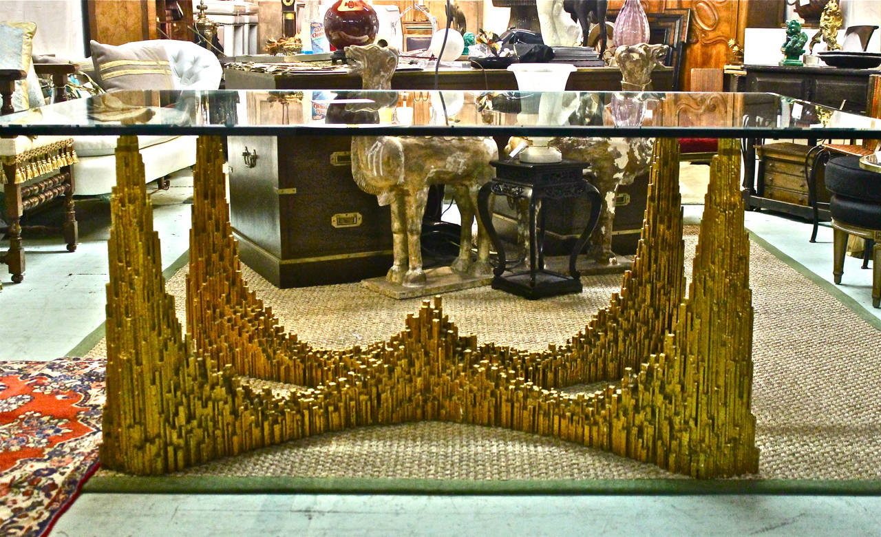 The table is composed of carved pieces of wood applied to the shaped wood supports; the piece being subsequently gessoed and gilded in its entirety. The table is in excellent condition with minor loses to the gilding, as expected of a table of this