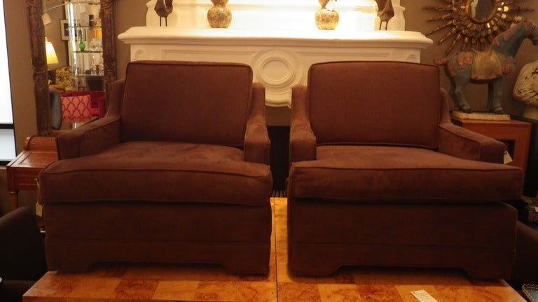 Pair of elegant brown faux suede arm chairs.