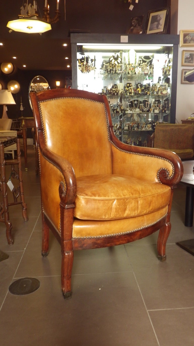 19th Century French Leather Chair with Scroll Arms