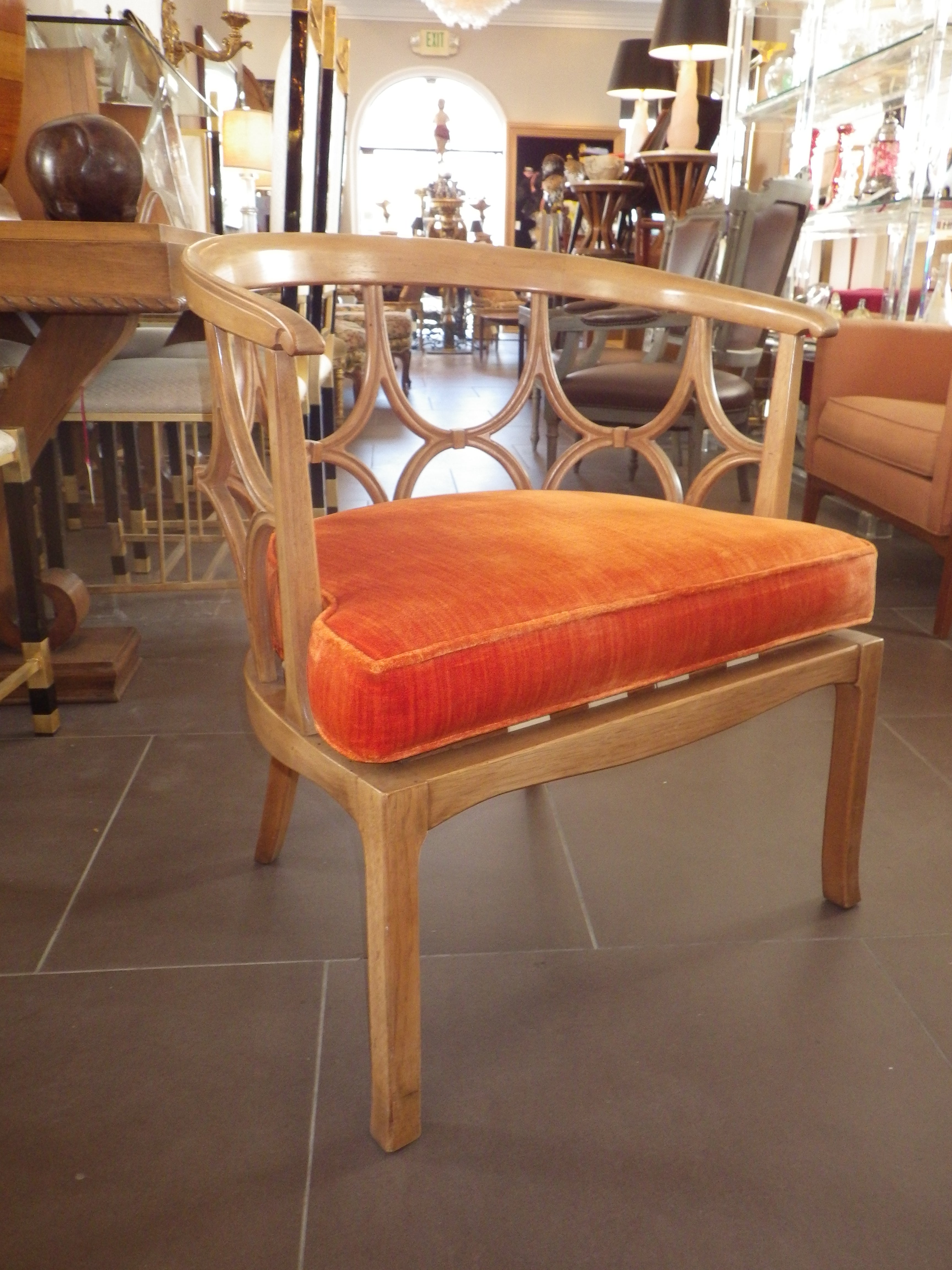 Pair of Beige Barrel Back Chairs with Orange Seat Cushions