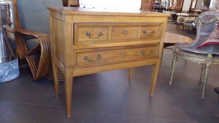 Beautiful, Louis XVI style chest of drawers.
Made of fruitwood woth brass inlay/pulls.