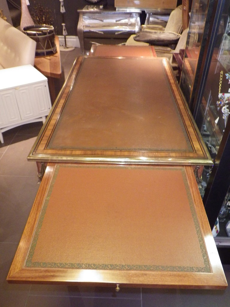 Very elegant desk from with gilded decorations and leather inlay.
Also has extensions similar to a game table.