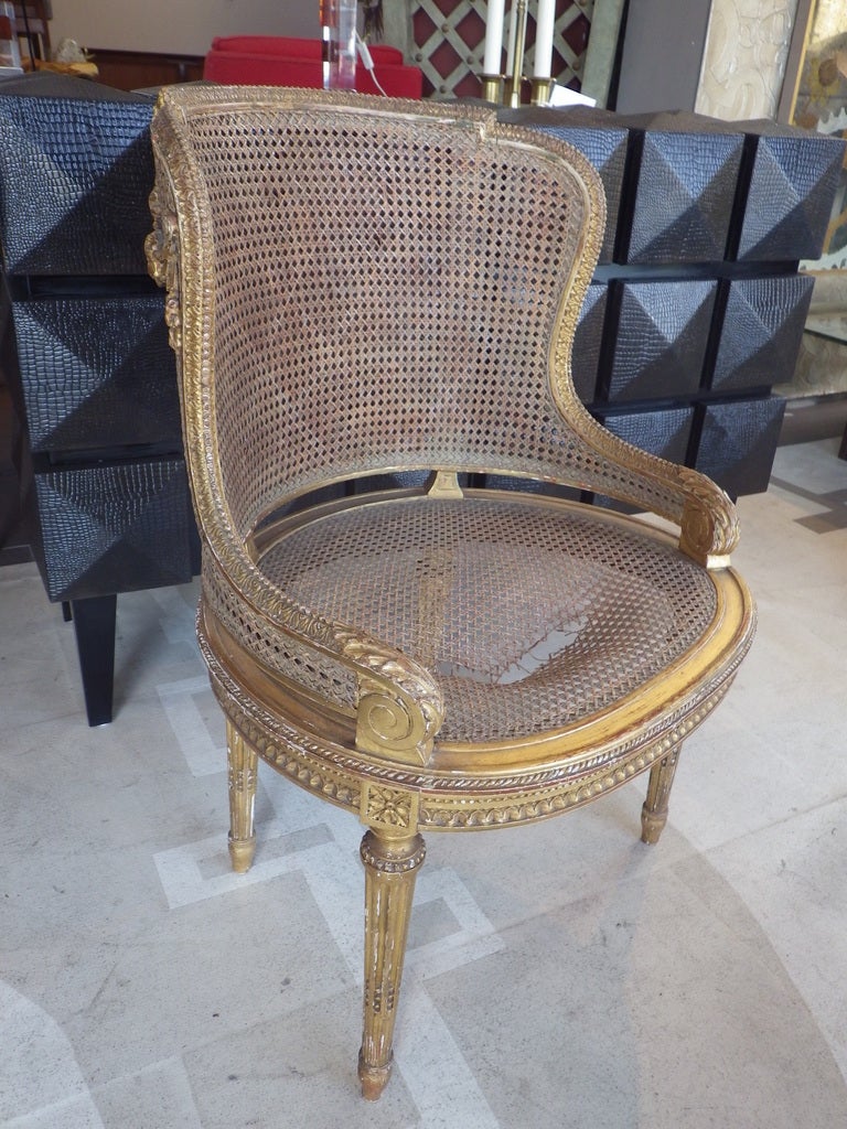 Elegant Early 19th century chair with caning throughout.