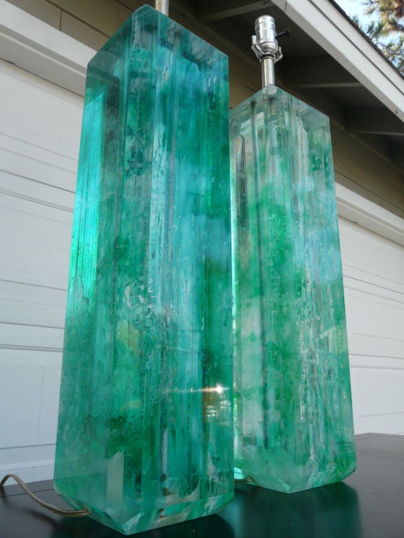Monumental pair of Vintage Mid Century stacked Lucite lamp bases, beveled top and bottom, rich emerald color mottled throughout the Lucite. Will stand up to 30