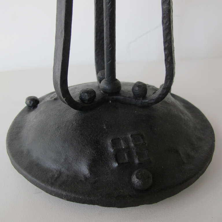 Wrought iron table lamps with mica widows.