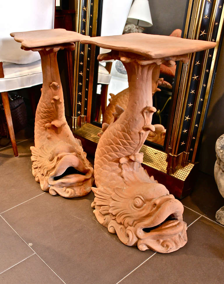 These dolphin pedestals are highly detailed and in excellent overall condition. The plateaus have had minor invisible restorations; the dolphin bases are in excellent original condition.
Measurement: 28