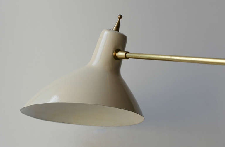 Italian lamp with counter-weight arm attributed to Vittoriano Vigano for Arteluce. Brass body, marble base, and lacquered metal shade.