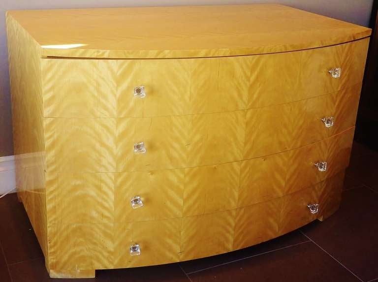 Beautiful over-sized dresser form the 1970s. Features four large drawers with rounded face and lucite pulls. Maple body.