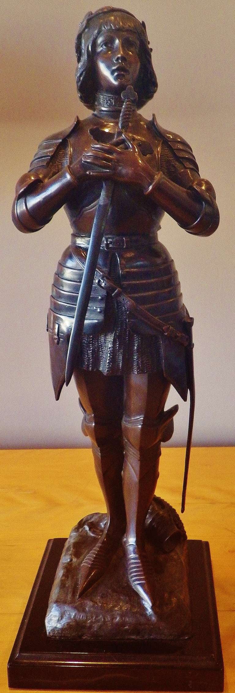 This elegant Joan of Arc rendition features stunning detail and immaculate  sculpting. Except for the base, the entire piece is made of solid bronze. This is a true collector's item.