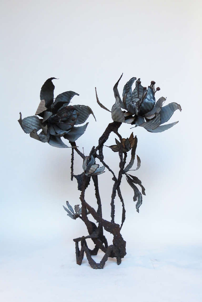 Brutalist iron sculpture.