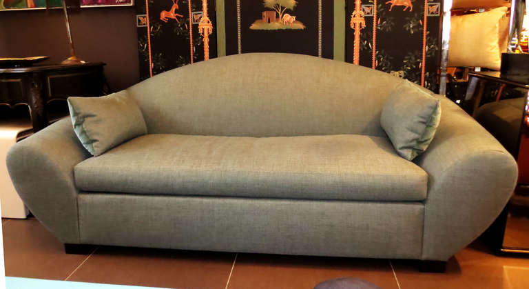 Elegant Post-Modern sofa with tea green upholstery. The seat cushion is down filled.

Disclaimer: Please contact us in advance if you would like to view this item at our showroom. We have a large inventory and many of our items are stored at our