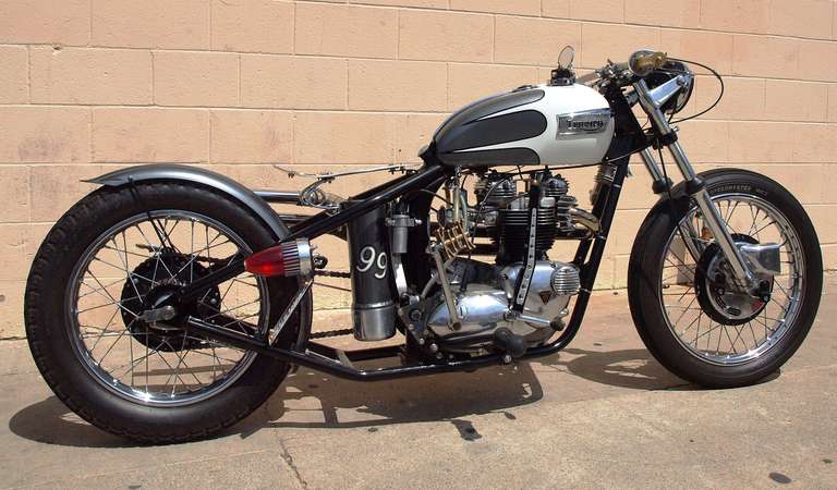 Featured in Easyrider Magazine, February 2014, this oil in-frame bike has many custom items. The frame cut with 6 inch hard tail added, lowered 3 inches, stainless steel drag bars, brass grips and kicker(cut to say kick), original Wassell side drag