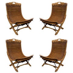 Four rattan & wood patio chairs by Kalma