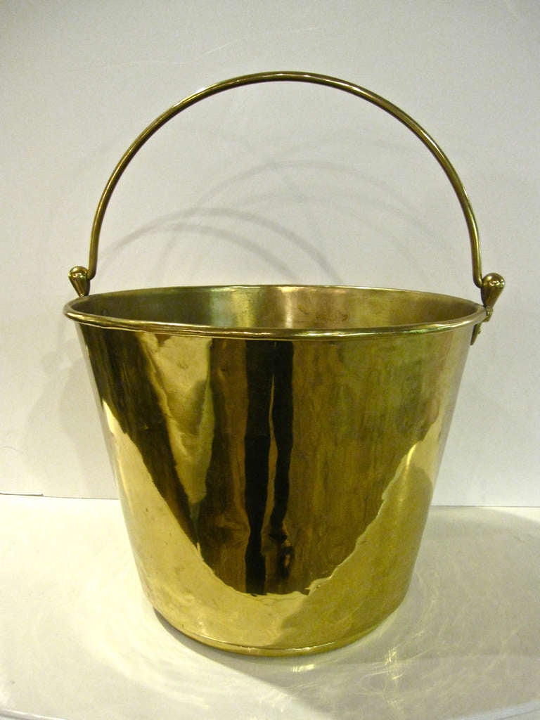 This is a wonderful 19th c. brass bucket. With exception of a minor ding to the lower edge, the bucket is in very good condition. The bucket measures 14