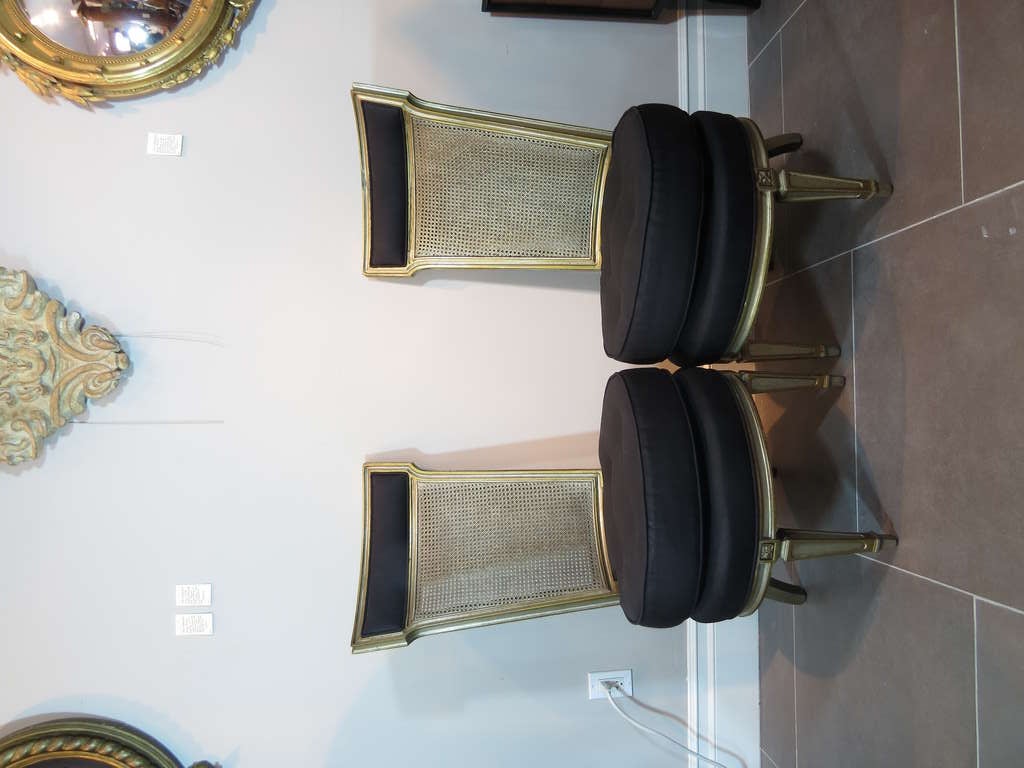 These beautiful art moderne slipper or boudoir chairs have been recently reupholstered in Ralph Lauren linen. Cane backs with silver and gold lacquered frames and legs. Louis XVI style.

Disclaimer: Please contact us in advance if you would like
