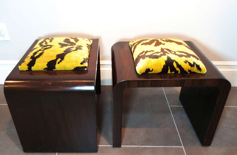 Beautiful solid ebony stools with dark walnut finish. the upholstery is made of the famed Scalamandre Le Tigre silk velvet upholstery. Macassar.