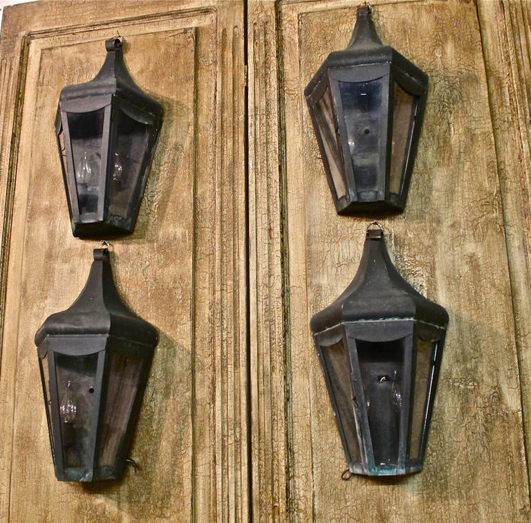 Set of Four Vintage Copper Wall Lanterns In Excellent Condition In Los Angeles, CA