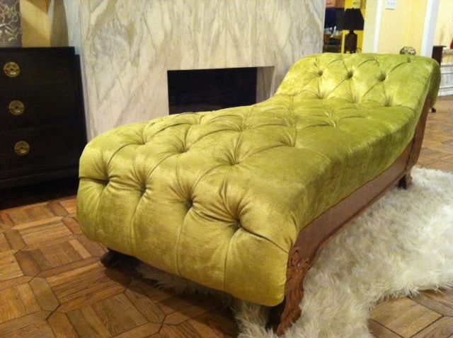 Velvet chaise on carved wooden base