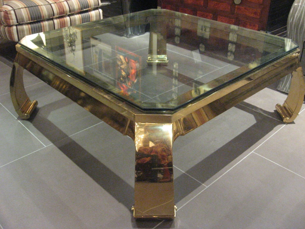 This low square coffee table is a uniquely expressive piece because of the exxageratedly bowed legs it boasts