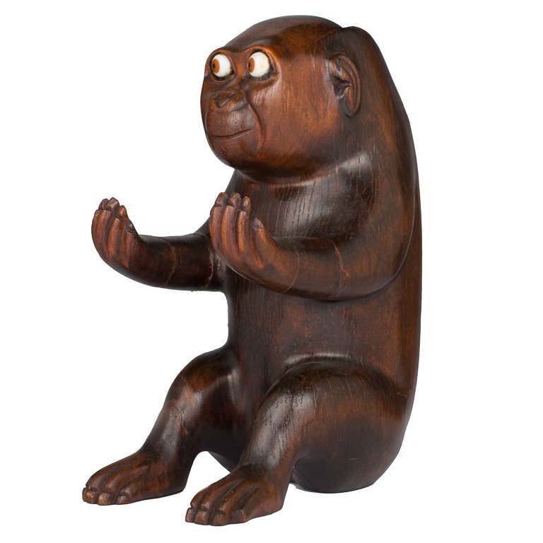 Rare novelty 19th century spill container in figural form of a Monkey.
Designed to be wall mounted beside a fireplace and hold matches.
Good original patina with glass eyes.