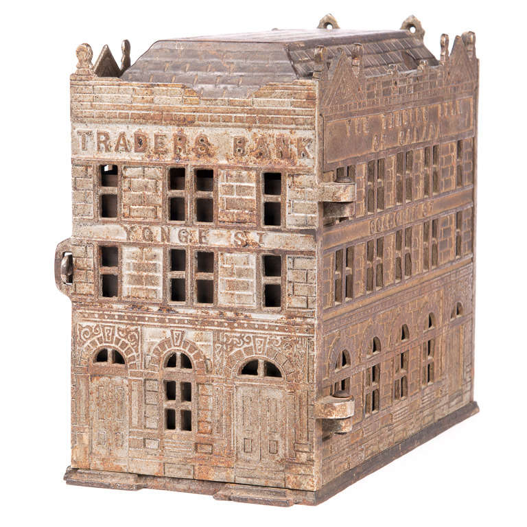 Exceptional late 19th century Architectural model piggy bank for the Toronto, Canada based Trader's Bank. The top is inscribed 'property of the Trader's Bank of Canada registered by AE Jarvis 1891, the traders bank sole licensee. The front of the