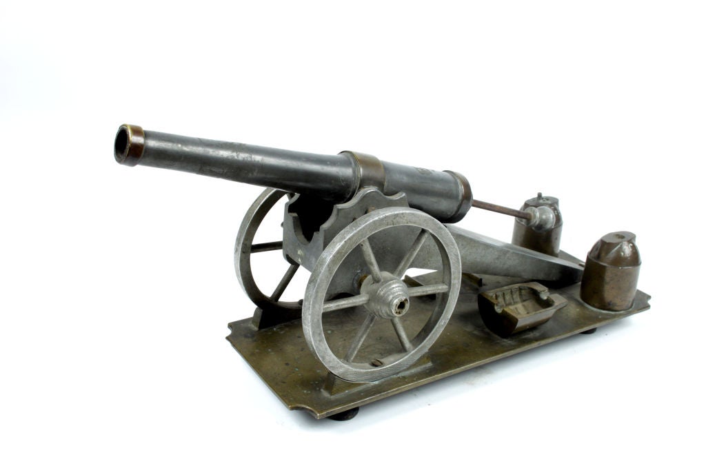 A finely cast model of a cannon.